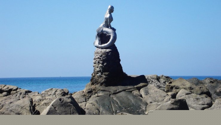 The Little Mermaid at Ngapali Beach on the Bay of Bengal on the western coast of Myanmar / Burma